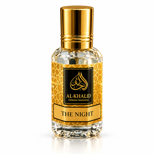 Al Khalid Perfumes The Night inspired attar oil in a sleek glass bottle, showcasing a luxurious fragrance for aromatic use.