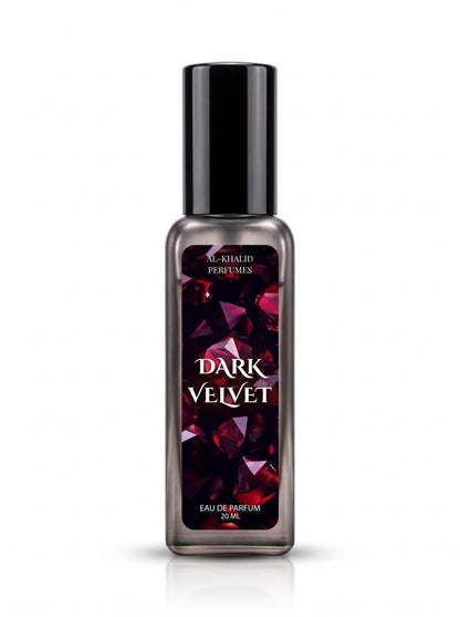 A 20ml bottle of Al Khalid Perfumes 'Dark Velvet' Eau de Parfum. The bottle is a dark smoky gray with a black cap and a label featuring a dark purple and red faceted gemstone pattern with white text.